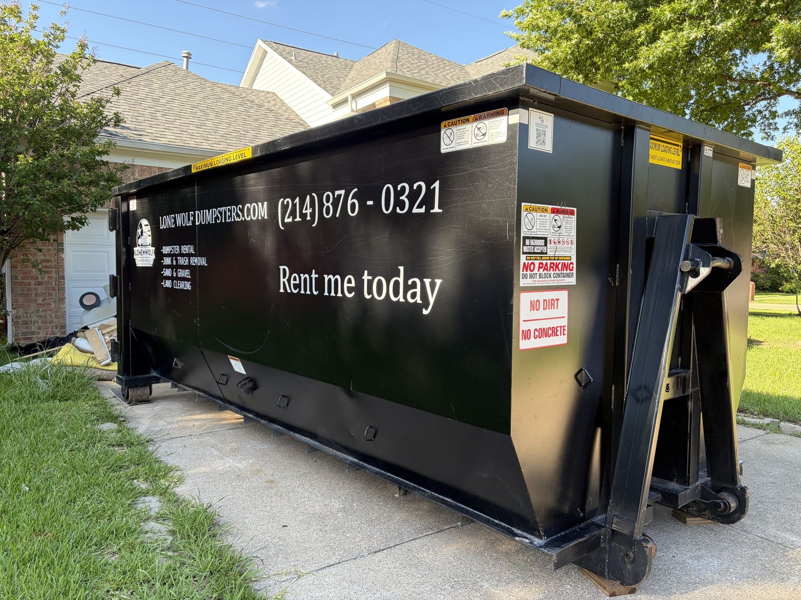Real Lone Wolf Roll-Off Dumpster Ready for Delivery in DFW